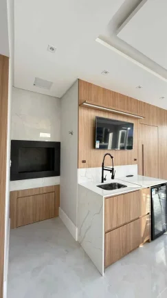 Imagem Casa em condomínio com 4 suítes e 2 vagas de garagem