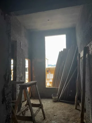 Imagem Casa em construção com 3 dormitórios sendo 1 suíte e 2 vagas de garagem em Palhoça/SC
