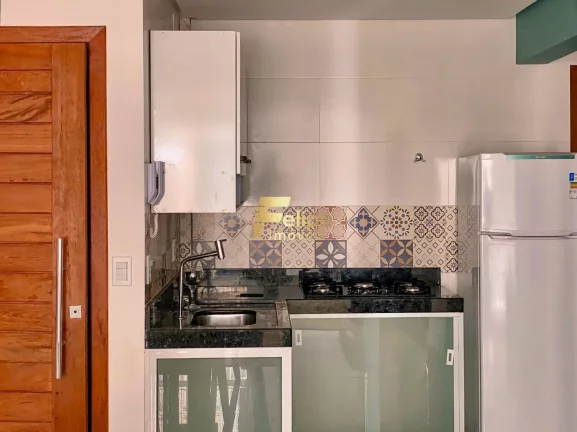 Imagem UM LINDO APARTAMENTO COM PRÉDIO NA FRENTE DA PRAIA.