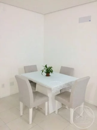 Imagem Vendo apartamento em Bairro Arreias São José SC, de três dormitórios, suíte, duas vagas livres, cozinha e área de serviço mobiliados.