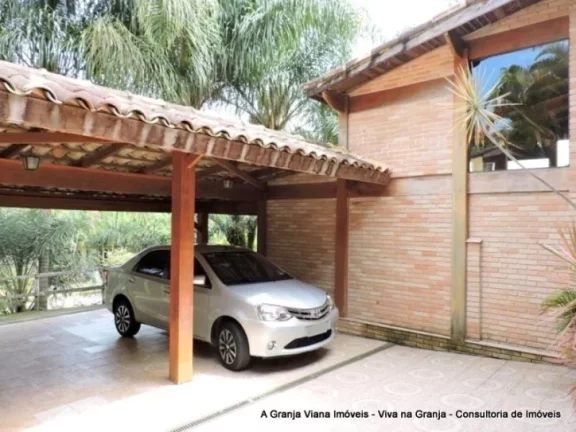 Imagem Muita privacidade com paisagismo tropical, piscina, 5 dormitórios e área gourmet completa.