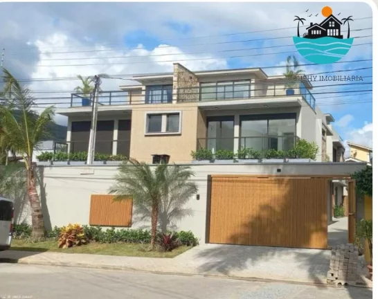 Imagem Casa em condomínio para venda em Juquehy, Aluguel de tempoarda, com 5 suítes, 395m² de área, 300m da praia, max 12 pessoas | Juquehy Imobiliária