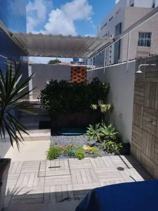 Imagem Apartamento térreo com área de lazer privativa no coração do Bessa – a apenas três quadras da praia!
