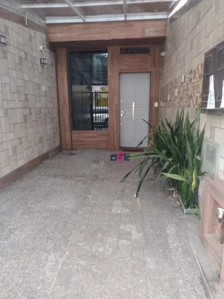 Imagem Casa com 3 dormitórios à venda, 240 m² por R$ 1.750.000,00 - Gonzaga - Santos/SP