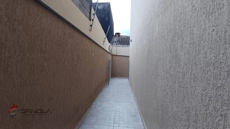 Imagem Sobrado com 2 dormitórios à venda, 58 m² por R$ 320.000,00 - Maracanã - Praia Grande/SP