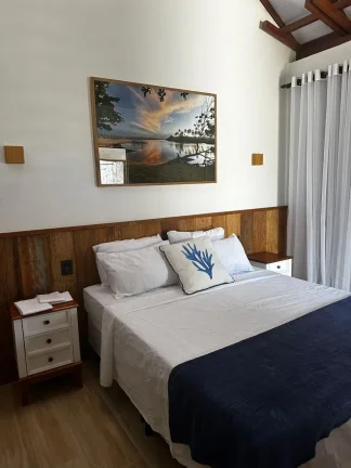 Imagem Casa em Condomínio à venda em Imbassaí, Mata de São João - Condomínio fechado com vista para o mar
