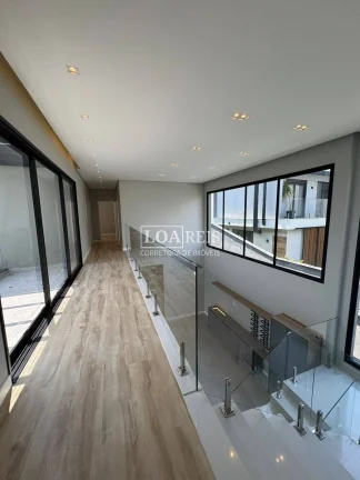 Imagem CASA 4 SUÍTES SENDO 1 SUÍTE MASTER CONDOMÍNIO ALPHAVILLE II