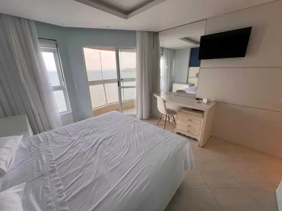 Imagem Apartamento frente mar com 3 suítes e 4 vagas de garagem em Balneário Camboriú