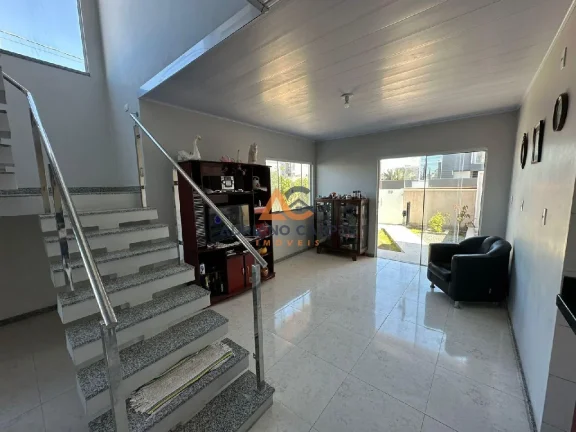 Imagem Sobrado de 4 dormitórios, sendo 1 suíte a 50m do mar no bairro Meia Praia, em Navegantes - Adriano Carpes Imóveis vende