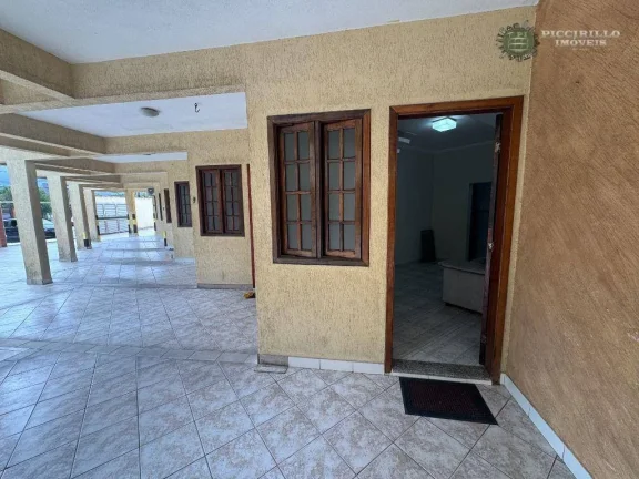 Imagem Casa de condomínio com 2 dormitórios à venda, 62 m² por R$ 430.000 - Vila Guilhermina - Praia Grande/SP