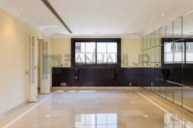 Imagem Com uma área privativa de 315m2, este apartamento luxuoso conta com um espaçoso living para três ambientes, sala de jantar e sala de almoço, além de u