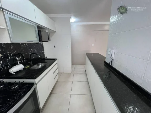 Imagem Apartamento com 2 dormitórios à venda, 63 m² por R$ 475.000 - Vila Guilhermina - Praia Grande/SP