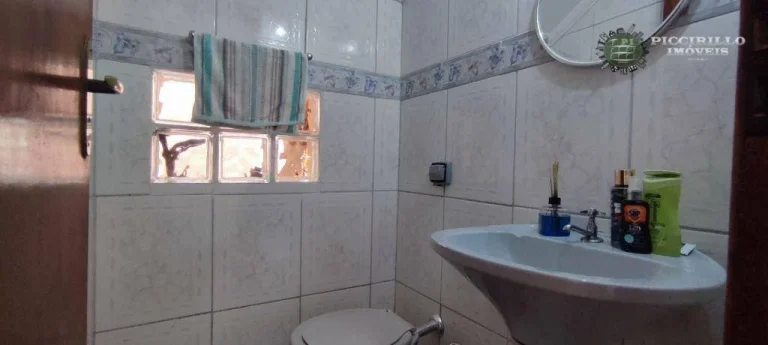 Imagem Sobrado com 3 dormitórios à venda, 118 m² por R$ 680.000,00 - Canto do Forte - Praia Grande/SP