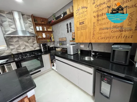 Imagem Casa em Juquehy para alugar - condomínio fechado com 5 suítes, 3 vagas, 100m da praia - Acomodação máx. 12 pessoas | Juquehy Imobiliária.