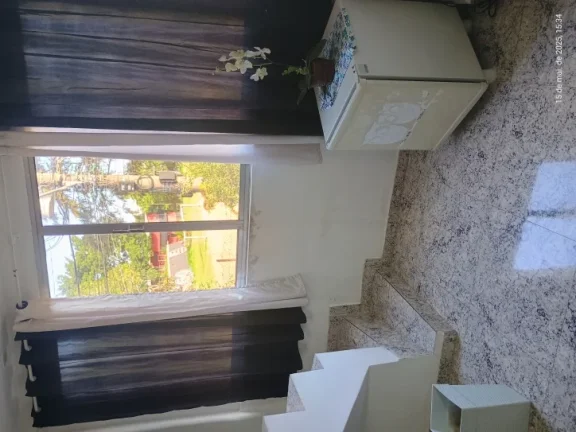 Imagem "Esse sobrado é tipo 2 em 1: casa linda + espaço pra ganhar dinheiro!"