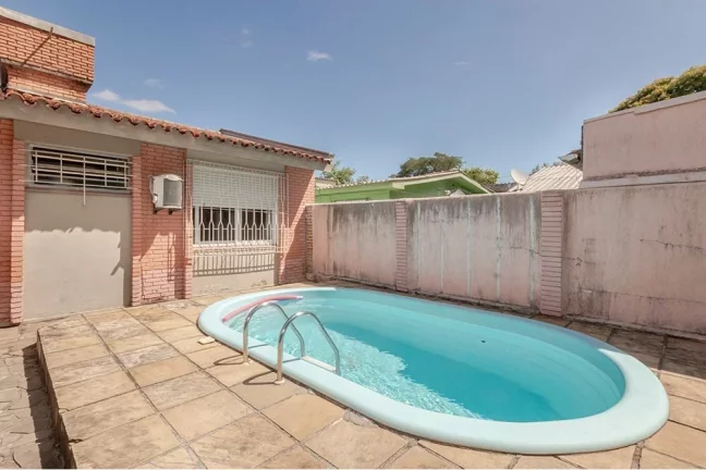 Imagem Casa com 4 Quartos à Venda,  em Camaquã - Porto Alegre