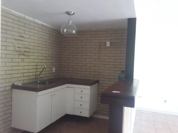 Imagem Village 3 Quartos Nascente com Vista Verde à Beira do Rio Joanes – Lazer Completo!”
