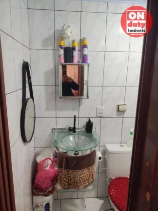 Imagem Apartamento com 2 dormitórios à venda, 64 m² por R$ 220.000,00 - Saboó - Santos/SP