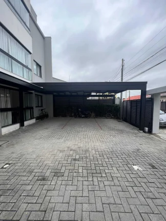 Imagem Apartamento com 2 dormitórios sendo 1 suíte e 1 vaga de garagem em Navegantes/SC