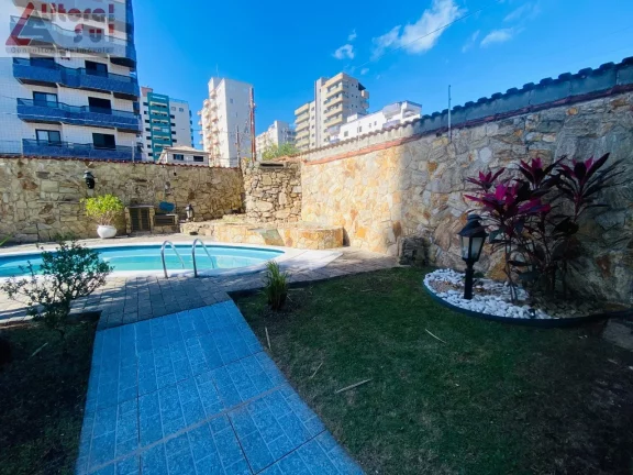 Imagem Casa para locação em Praia Grande-SP, no bairro Tupi: 3 quartos, 1 suíte, 1 sala, 2 banheiros, 4 vagas de garagem, 250m².