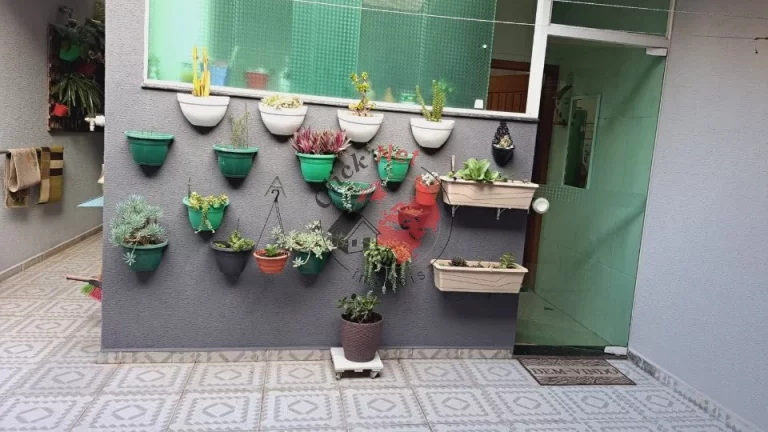 Imagem Sobrado Estudo permuta por apto menor valor ,3 dorms c suite , varanda ,quintal , churrasq,4 vagas, bairro Vila Camilópolis,Santo André