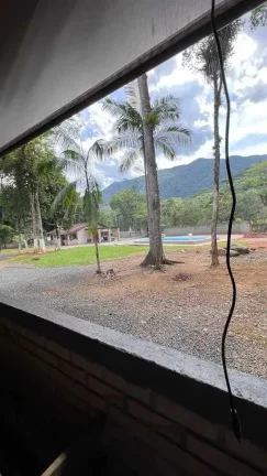Imagem Chácara com casa de 3 dormitórios sendo 2 suítes e 8 vagas - Quiriri | Joinville/SC