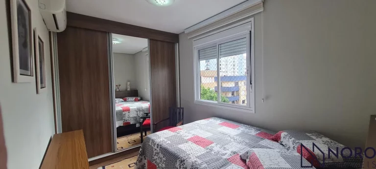 Imagem Apartamento Semi Mobiliado de 3 Dormitórios com Suíte e 2 Garagens no Bairro Men