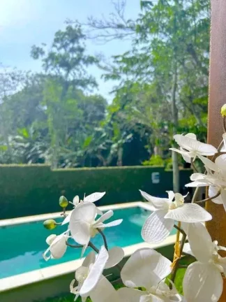 Imagem Casa com 3 dormitórios sendo1 suíte piscina e 2 vagas - Praia de Taquaras, Balneário Camboriú/SC