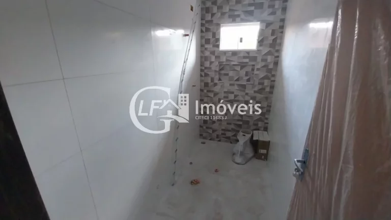 Imagem Casa Com Dois Quartos Mais uma Suite