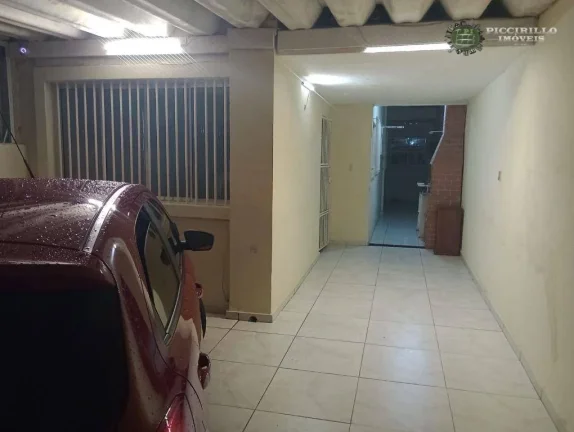 Imagem Casa com 3 dormitórios à venda, 78 m² por R$ 440.000,00 - Aviação - Praia Grande/SP