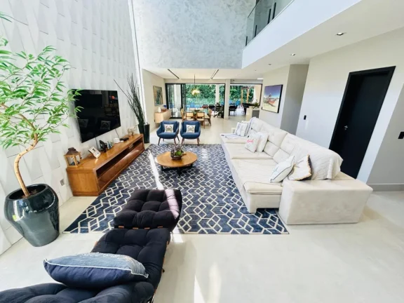 Imagem Casa de Luxo à Venda na Riviera de São Lourenço Módulo 17: 8 Quartos, 8 Suítes, 3 Salas, 4 Vagas de Garagem e 620m² de Área!