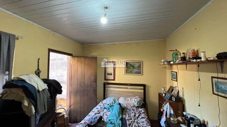 Imagem Casa padrão à venda no Fabrício, Uberaba - 4 dormitórios, 2 banheiros, garagem coberta