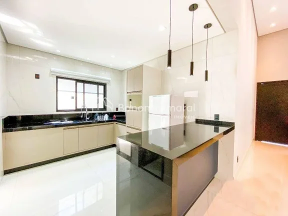 Imagem Casa térrea com 3 suítes, cozinha americana integrada às salas de estar e jantar, e área gourmet...