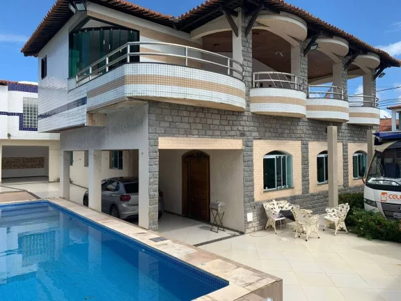 Imagem Casa de Alto Padrão na Atalaia - 4 Quartos, Piscina e Espaço de Churrasqueira - Imperdível!