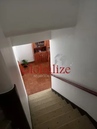 Imagem Sobrado à venda com 3 dormitórios e 2 vagas no bairro do Gonzaga em Santos por R$ 1.100.000,00