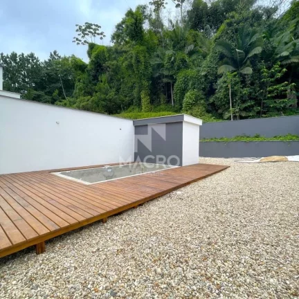 Imagem Sobrado alto padrão | Barra do Rio Cerro | 4 suítes | 225m²