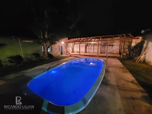 Imagem Casa de esquina em Caragua com 3 dormitorios e piscina a venda.