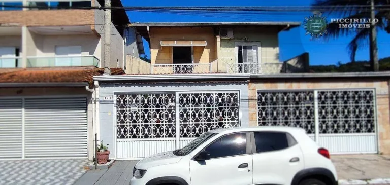 Imagem Sobrado com 3 dormitórios à venda, 118 m² por R$ 680.000,00 - Canto do Forte - Praia Grande/SP