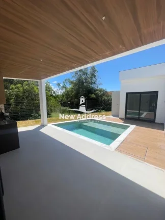 Imagem Alto Padrão: casa linear com 3 suítes à venda no Condomínio Riviera Park - Vila Velha