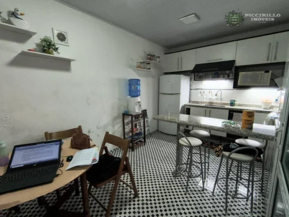 Imagem Casa com 2 dormitórios à venda, 115 m² por R$ 550.000,00 - Vila Guilhermina - Praia Grande/SP