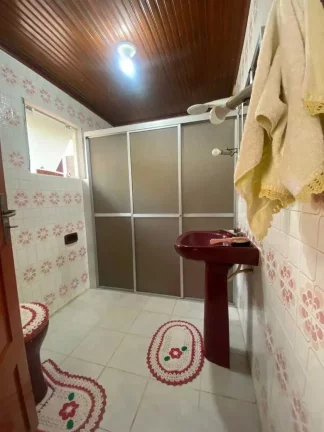 Imagem Casa com 3 dormitórios sendo 1 suíte e 3 vagas de garagem no Centro de Porto Belo