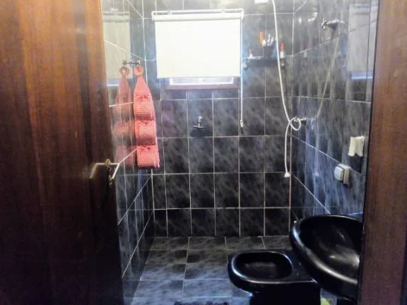 Imagem Sobrado com 235 metros de Construção 3 Dormitórios 2 Vagas de Garagens