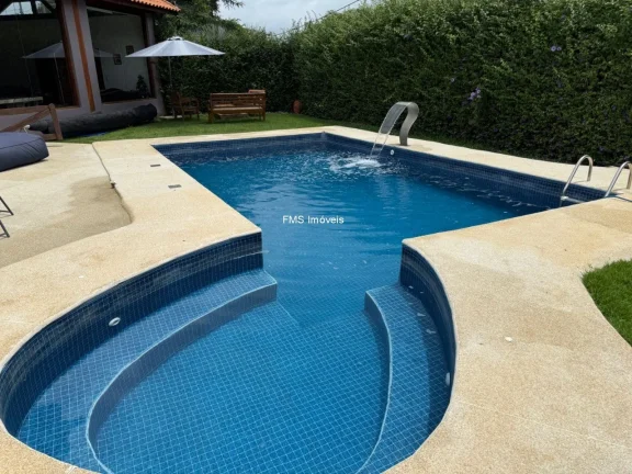 Imagem Oportunidade única: Casa de condomínio de alto padrão com 3 suítes e 4 vagas no Ninho Verde I, Porangaba-SP!