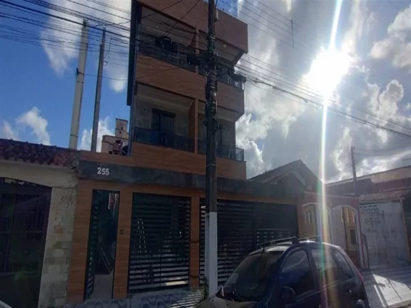 Imagem Sobrado com 2 dormitórios à venda, 77 m² por R$ 350.000,00 - Caiçara - Praia Grande/SP