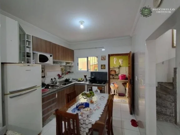 Imagem Sobrado com 2 dormitórios à venda, 100 m² por R$ 490.000,00 - Vila Guilhermina - Praia Grande/SP