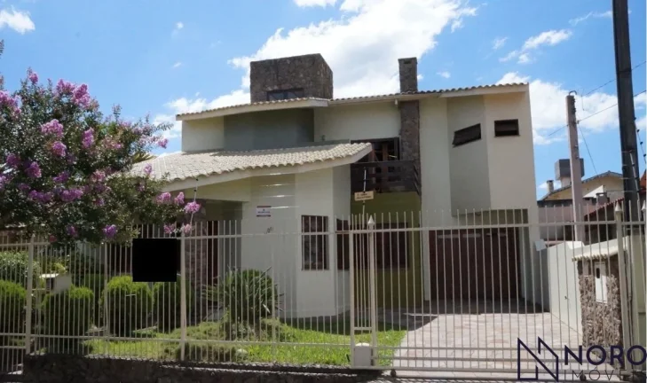 Imagem Casa ampla , 3 dormitórios, suíte,2 vagas de garagem no Bairro Duque de Caxias.