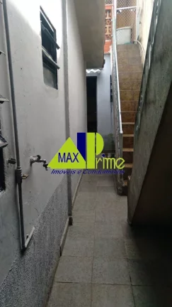 Imagem SOBRADO FRONTAL/130M²/03 CASAS NO QUINTAL/02 VAGAS COBERTAS