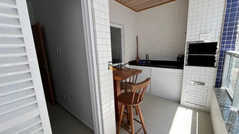 Imagem Apartamento à venda nas Toninhas com 1 dormitórios, varanda gourmet com churrasqueira e piscina