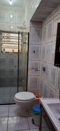 Imagem Casa com 3 dormitórios à venda, 114 m² por R$ 495.000,00 - Maracanã - Praia Grande/SP