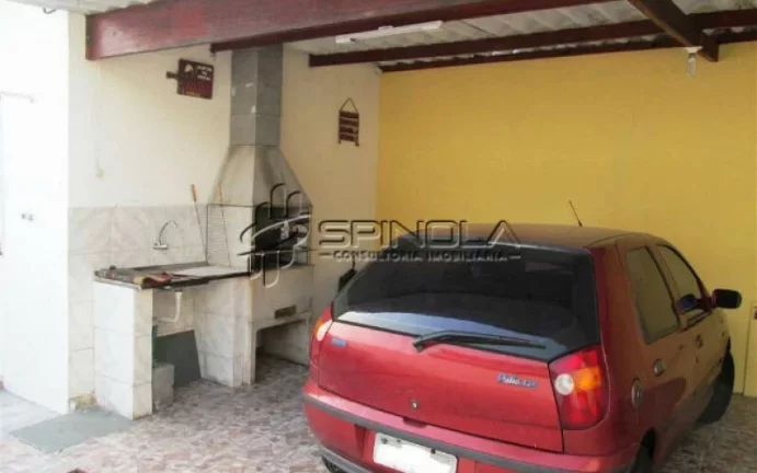 Imagem Casa com 3 dormitórios à venda, 190 m² por R$ 850.000 - Vila Tupi - Praia Grande/SP